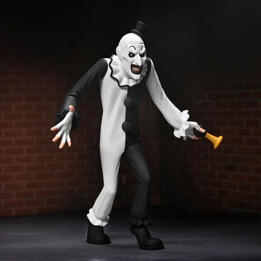 TERRIFIER - 6" SCALE ACTION FIGURE - TOONY TERRORS ART THE CLOWN