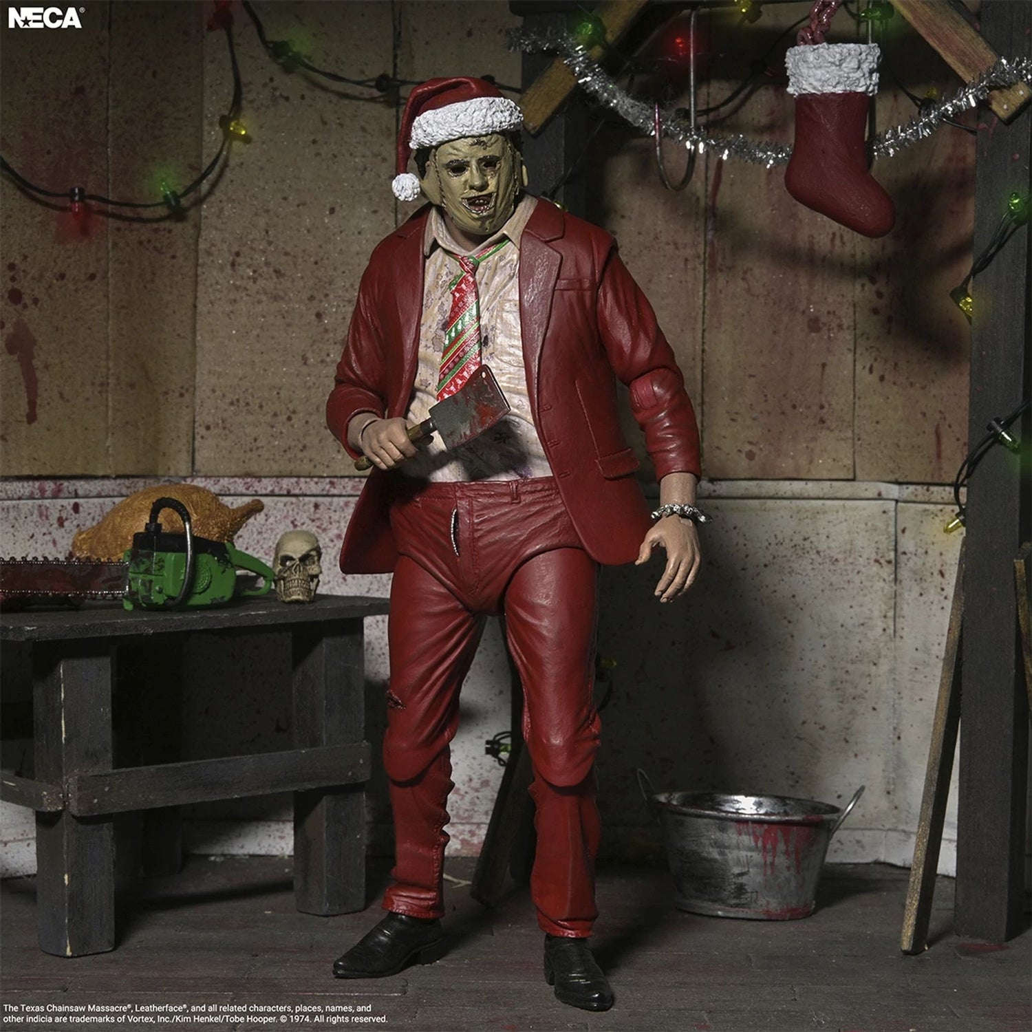 TEXAS CHAINSAW MASSACRE - 7 INCH SCALE ACTION FIGURE - ULTIMATE SANTA LEATHERFACE