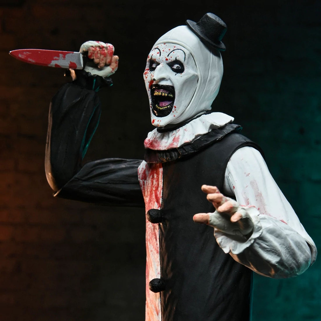 TERRIFIER 2 - 7" SCALE ACTION FIGURE - ULTIMATE ART THE CLOWN (BLOOD SPLATTERED)