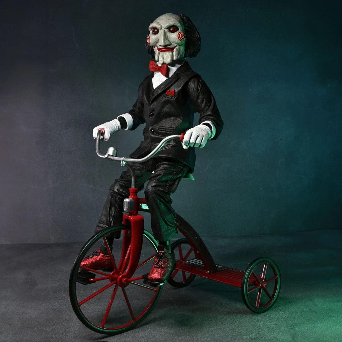 SAW – 12” ACTION FIGURE – W/SOUND RIDING TRICYCLE