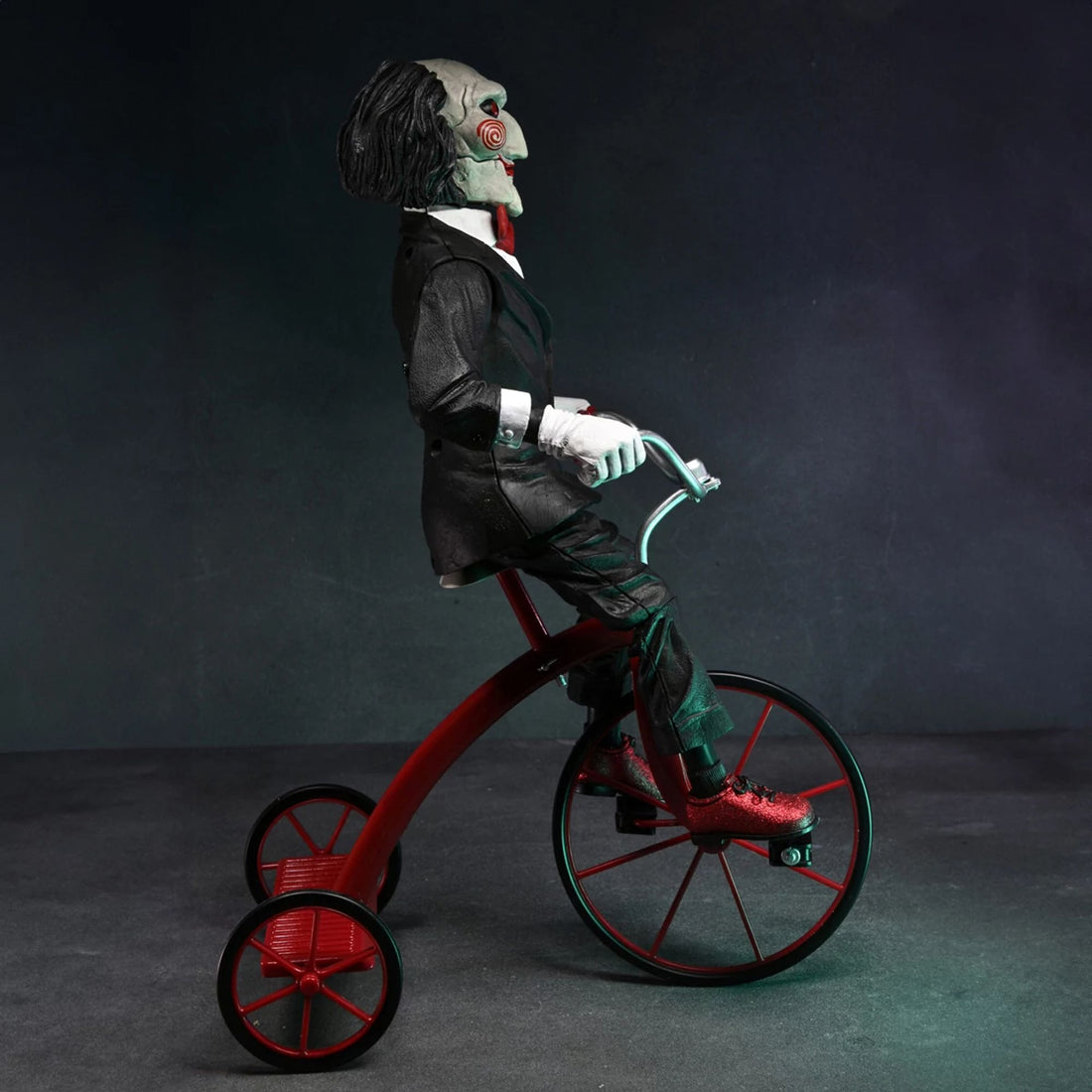 SAW – 12” ACTION FIGURE – W/SOUND RIDING TRICYCLE