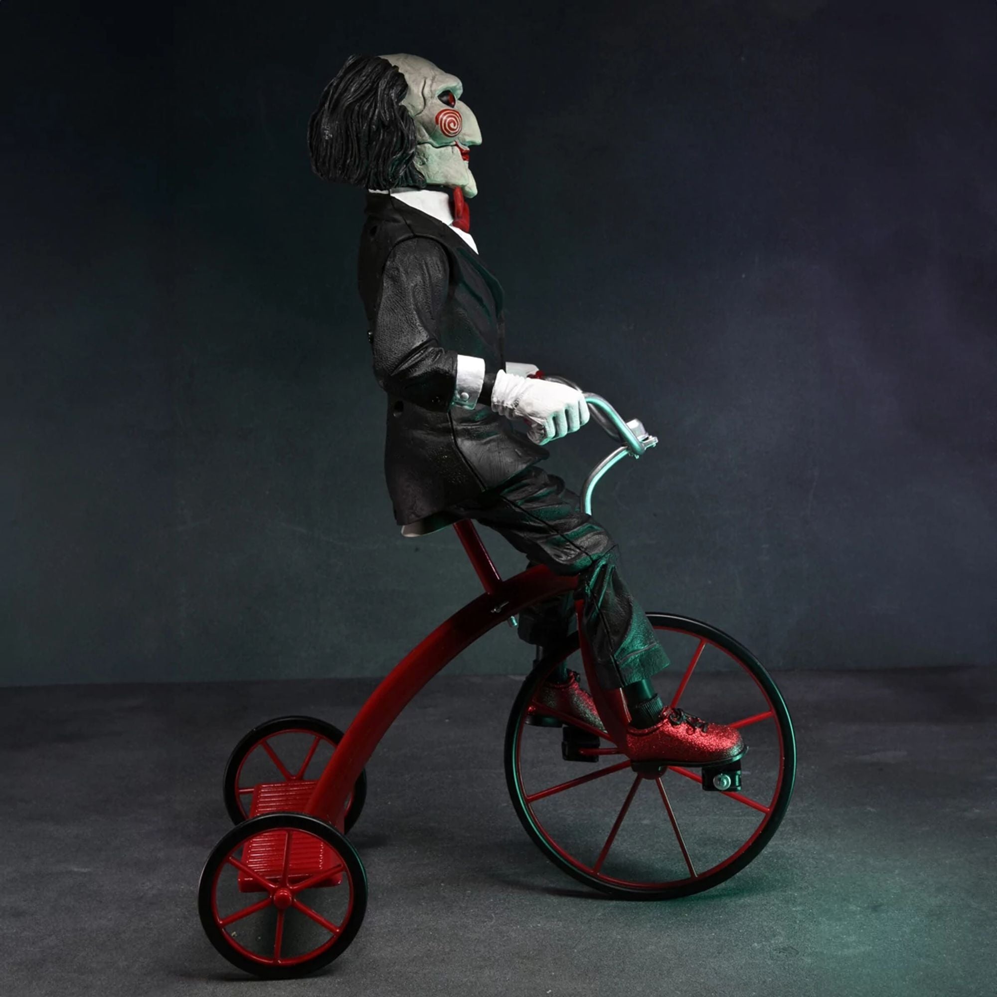 SAW – 12” ACTION FIGURE – W/SOUND RIDING TRICYCLE